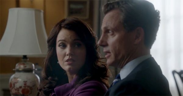 image of Scandal's First Lady Mellie Grant sitting beside President Fitzgerald Grant on a sofa for an interview, she is looking at him with surprise as he speaks