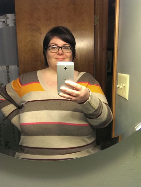 image of me standing in the bathroom mirror with my phone, taking a picture, while wearing the stripey jumper