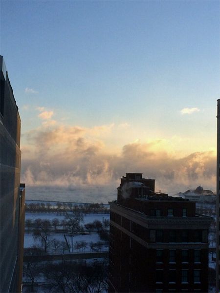 image of a huge plume of steam rising off the surface of Lake Michigan