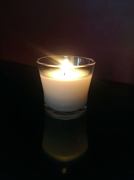 image of a candle burning at my home this morning