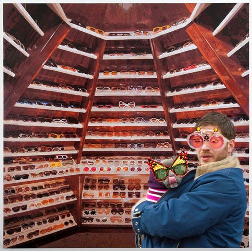 image of Tom Hardy and a grey pit bull puppy each wearing a pair of Elton John's sunglasses while standing in Elton John's sunglasses closet