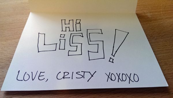 image of card in which masculine_lady has handwritten: 'HI LISS!' in giant block letters, with 'Love, Cristy xoxoxo' just below
