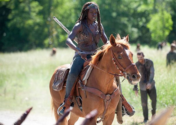 image of Michonne (Danai Gurira) riding a horse and looking totally badass