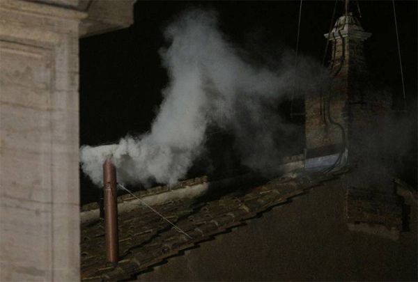 image of white smoke above The Vatican