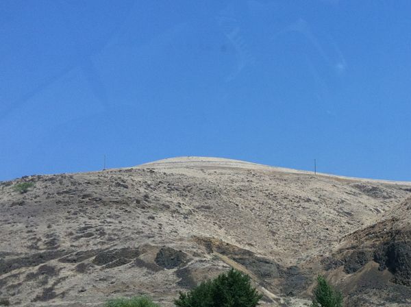 image of dusty mountaintop in the desert