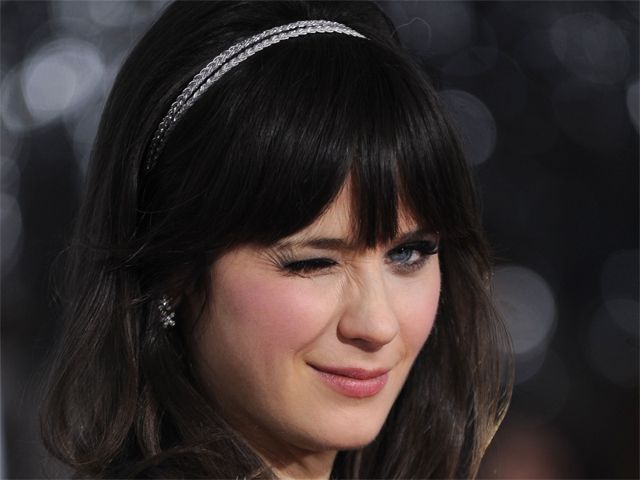 image of Zooey Deschanel winking