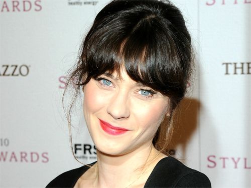 image of Zooey Deschanel at some event, smiling