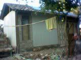 Rumah darurat Kang Fauzan, saudara yang biasa memperbaiki rumahku, ikut jadi korban.