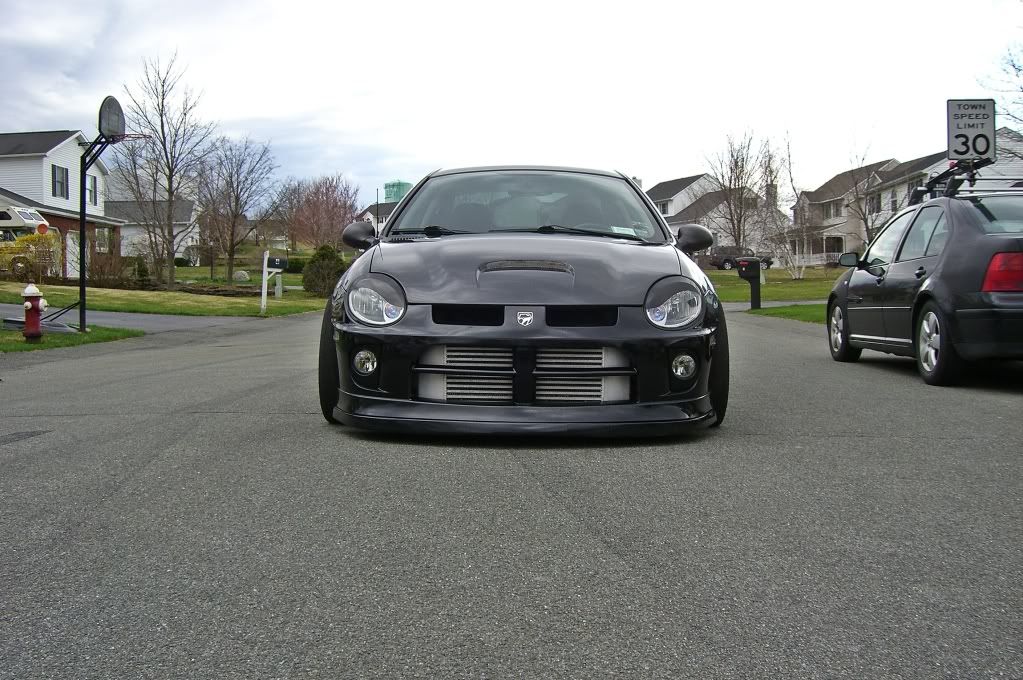 my buddy's srt4 low but the wheels aren't flush he has it set up so he can