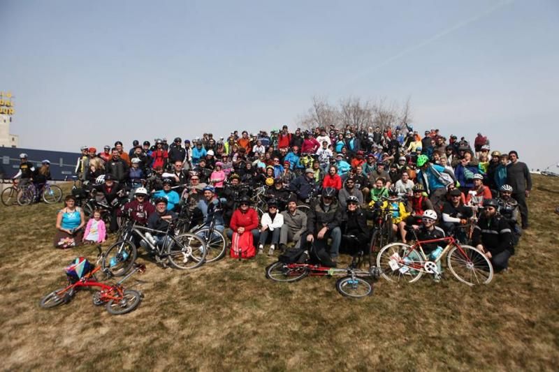 Large group of riders gathered for a photo