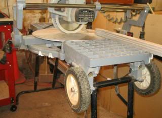 Rockwell Sawbuck frame and trim saw on rolling stand is in good used 