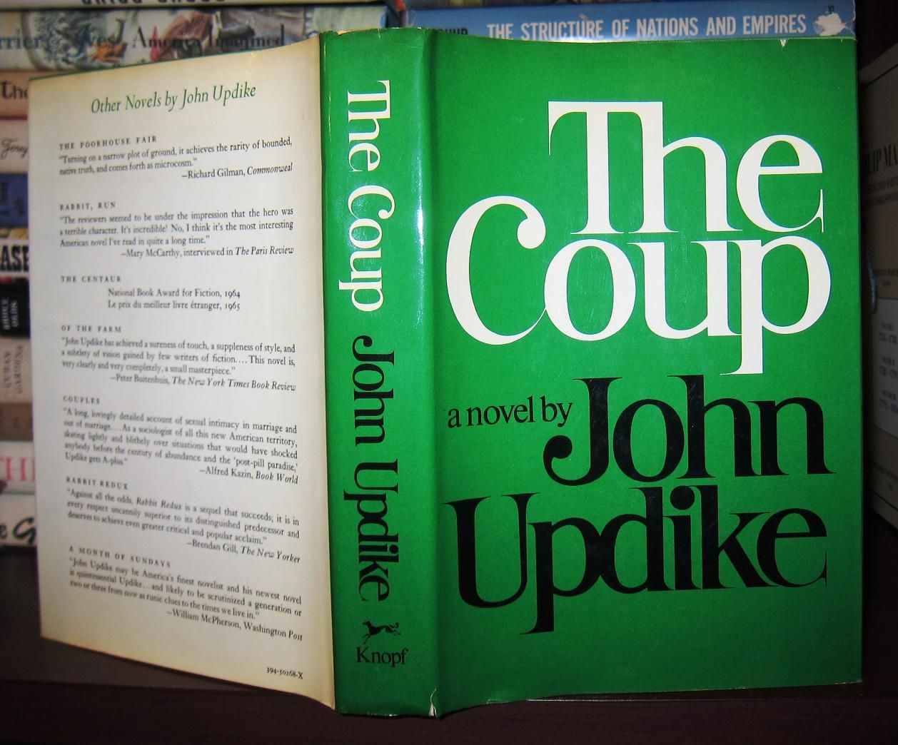 UPDIKE, JOHN - The Coup