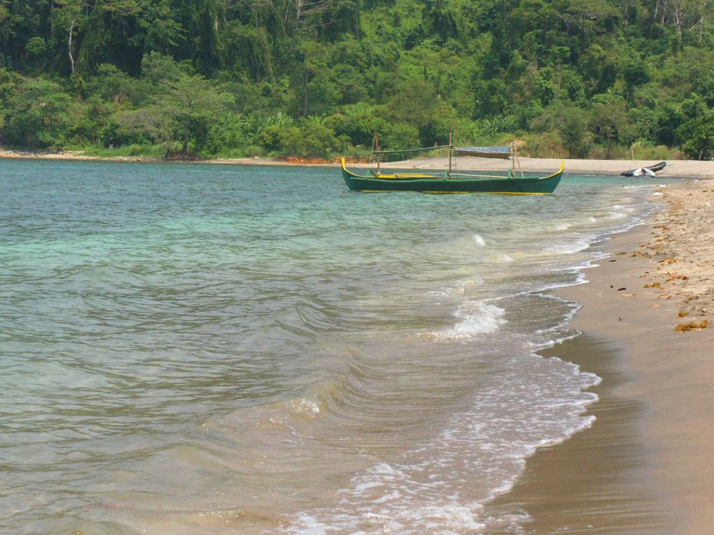 saturated sweet water beach with boat