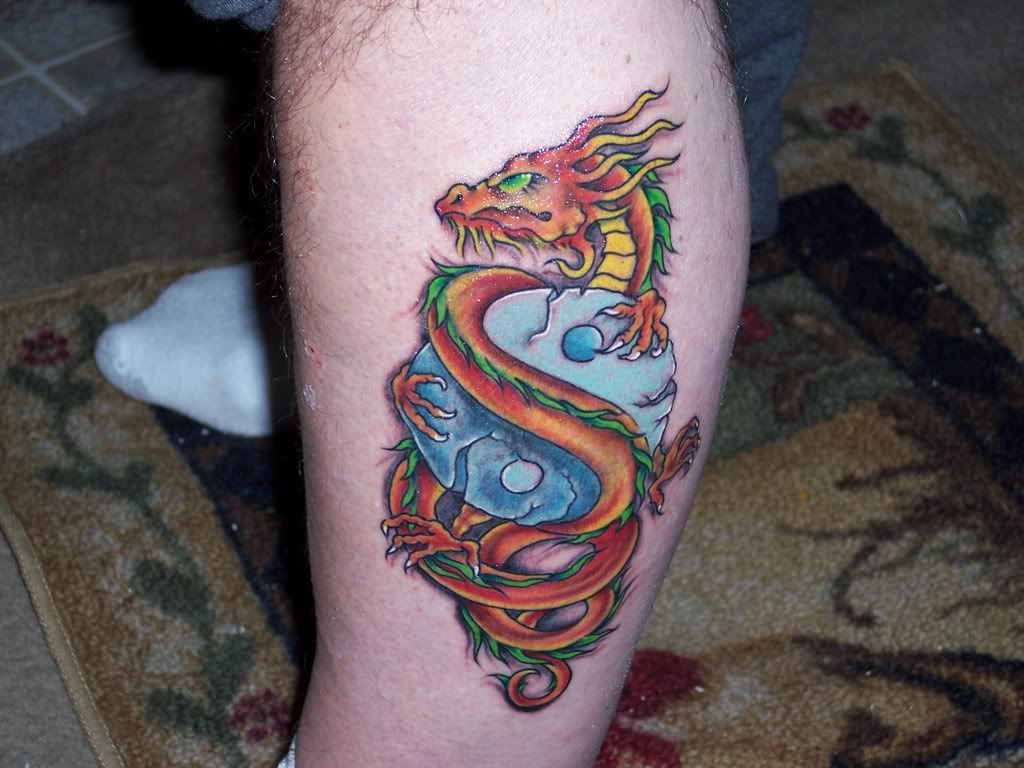 Angry Red Dragon Tattoo title=