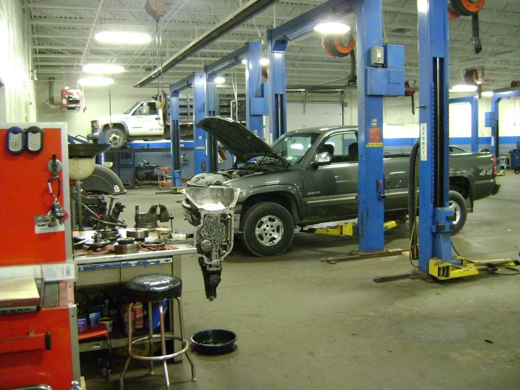heres my 2 Lifts, one with the pick up on it, and the empty bay in the  foreground .