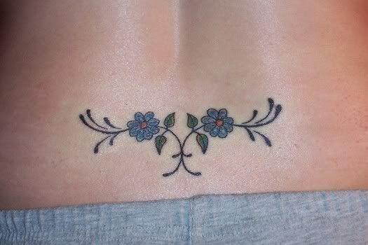 Twin flower, lower back tattoo