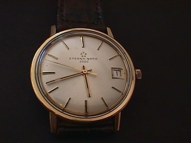 Eterna-matic3000goldcapsswhitedial.jpg