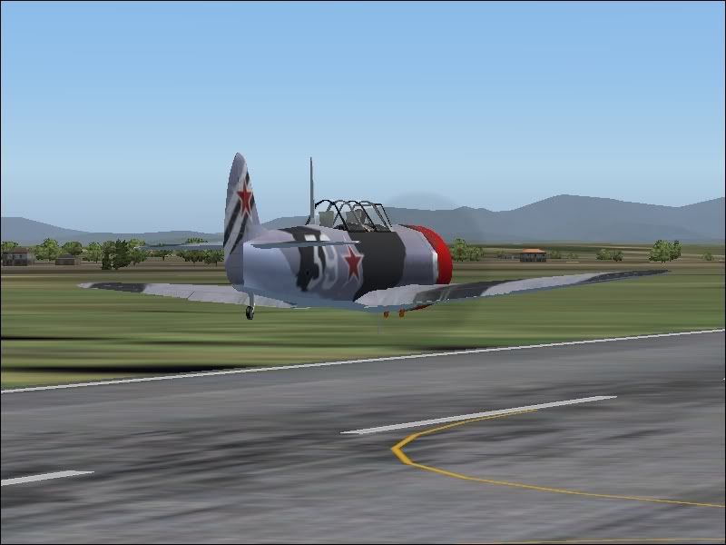 http://img.photobucket.com/albums/v693/skylinerworld/Rota%202008/Rota2008flying/Yak11Demo2.jpg