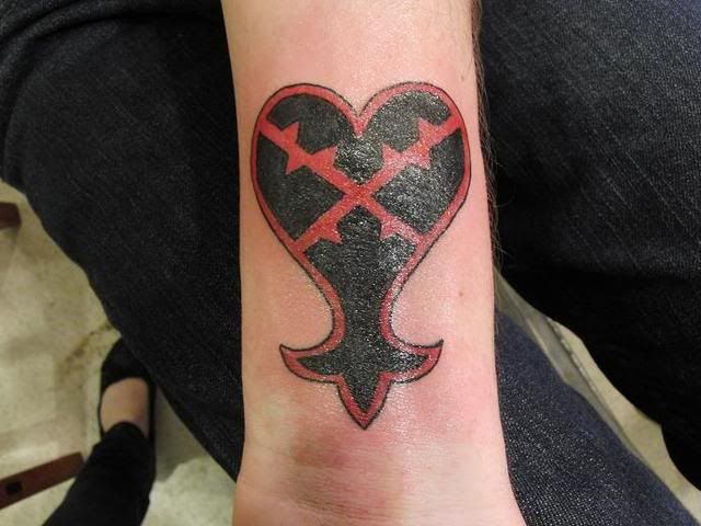 Broken Heart Piercing Tattoo