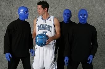 J.J. Redick poses with Blue Man Group.