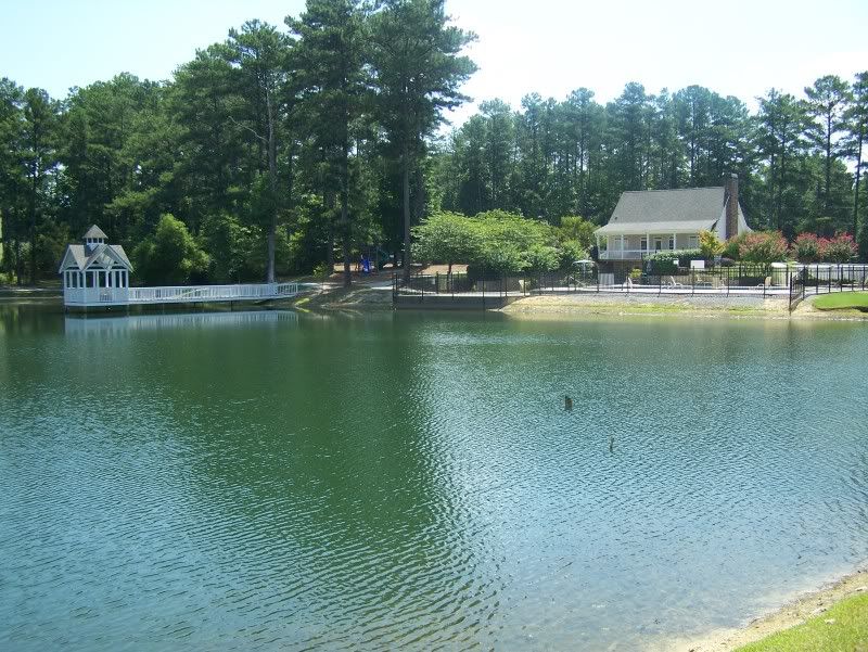 The lake, gazebo, clubhouse, and pool at Lost Mountain Lakes