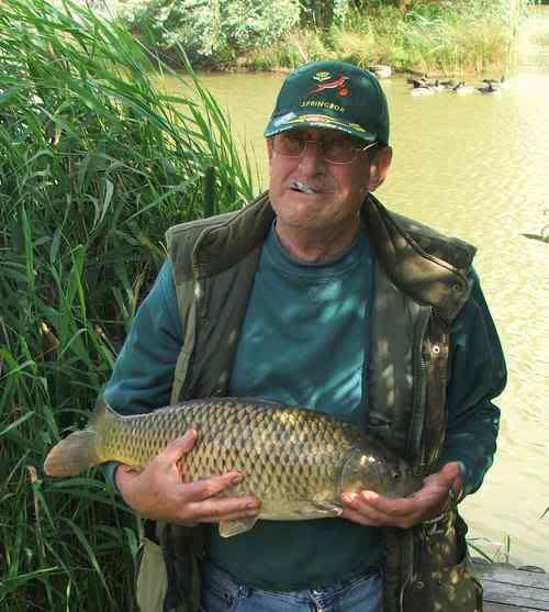 W12.jpg Bob and a PB Carp picture by pnm123