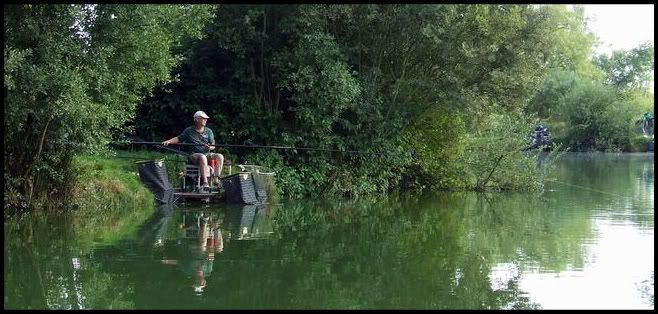 a69.jpg Peter playing a Carp on peg 13. picture by pnm123