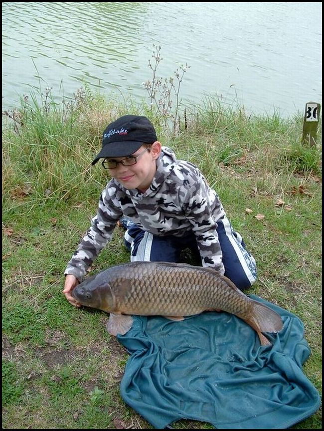 Liam with his PB 20lbs Common Carp