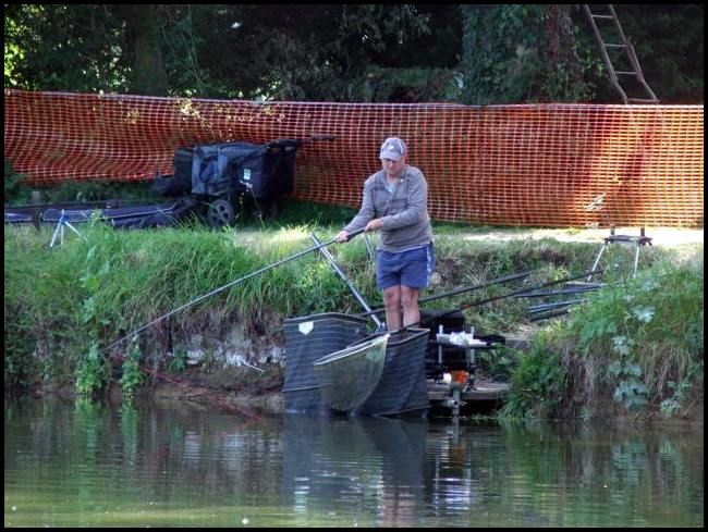 SimonWatkins.jpg Simon Watkins plays a carp