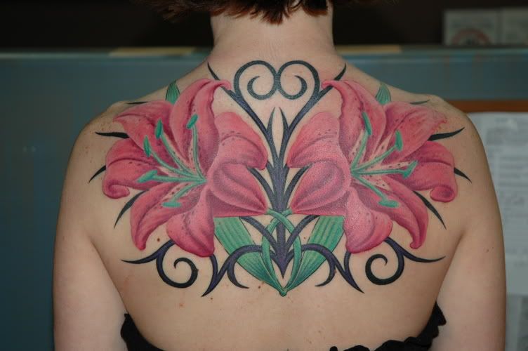 flower tribally back tattoo