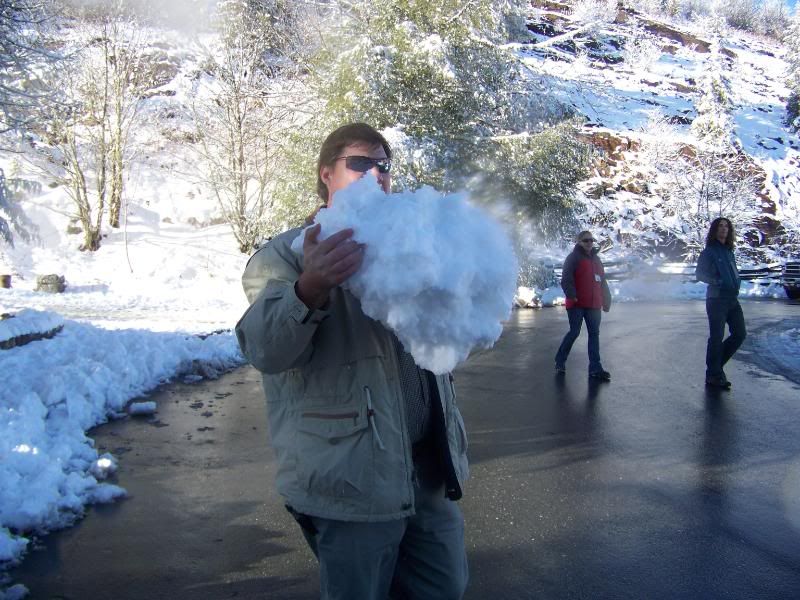 The kids want to have a snowball fight with daddy. So Daddy arms himself with a snow BOULDER!