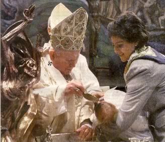 Pope JPII baptizes