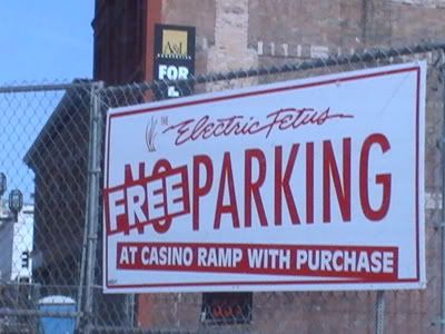 electric fetus free parking sign