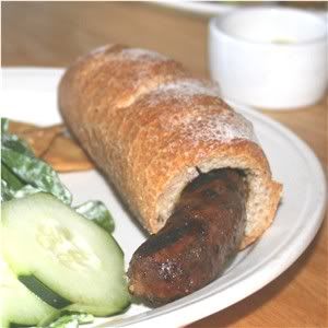 Nancy's long sweet sausage in a bun.