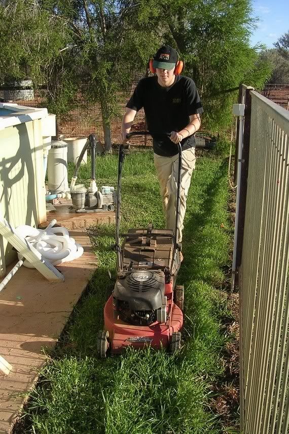 Josh Mowing Lawn