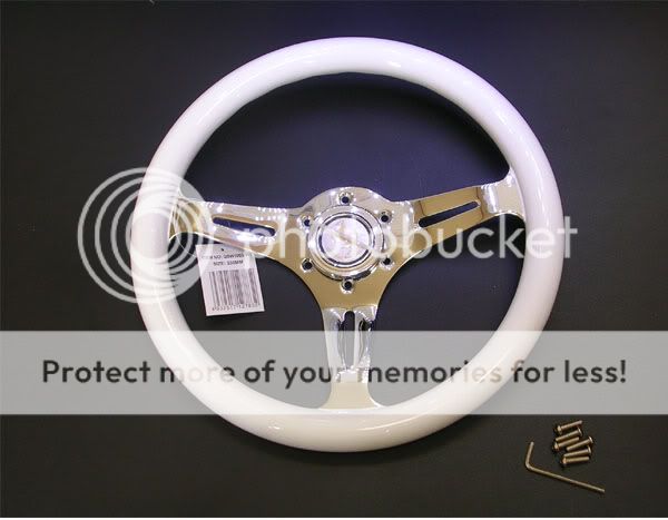 while im at it  330mm  350 mm white steering wheel GB  $80 330mm