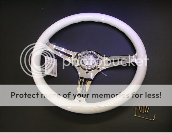 while im at it  330mm  350 mm white steering wheel GB  $80 350mm