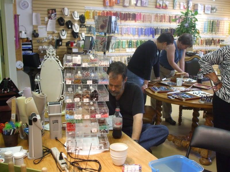 Shopping Helping Vikki shop while hubby reads in the midst of chaos