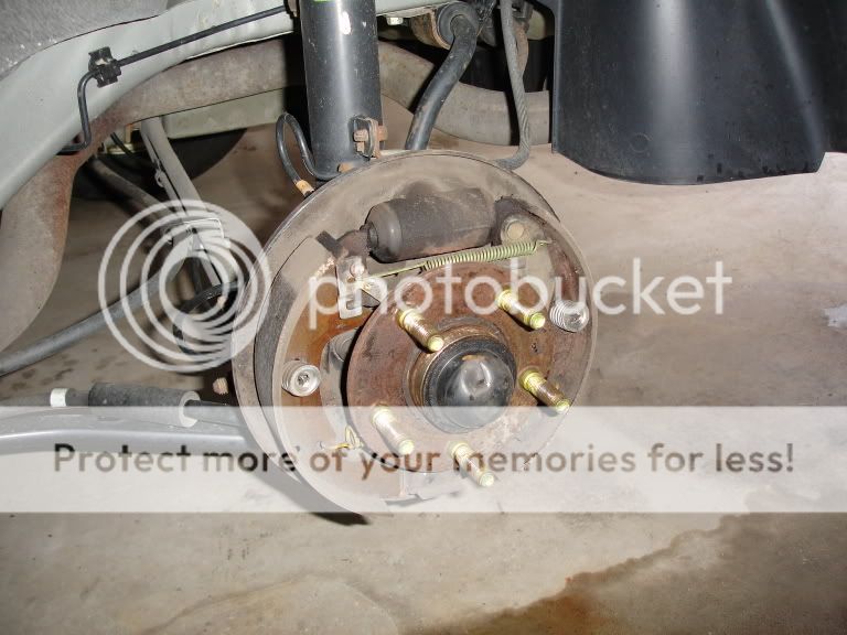 Replace rear brake shoes 2000 ford taurus