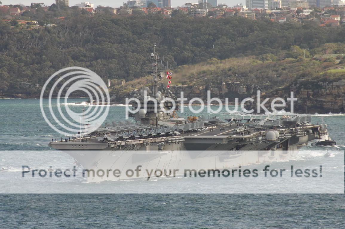 موسوعة صور حاملات الطائرات 100707-USSKH_sails_fm_Sydney-03