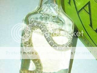 Agents Seize 411 Bottles of Rattlesnake-Infused Vodka in Tex 3_61_031808_SnakeAlcohol