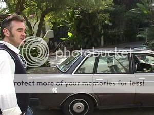 Morrissey by my car, Brown Thunder, looking at all my stickers, very impressed.