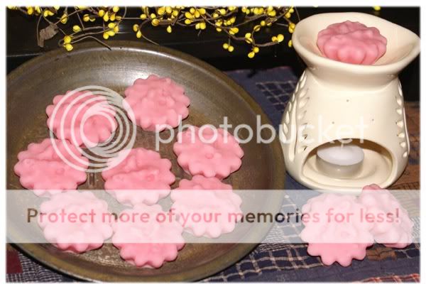 This auction is for 7 one ounce Honeysuckle Rose candle tarts, like 