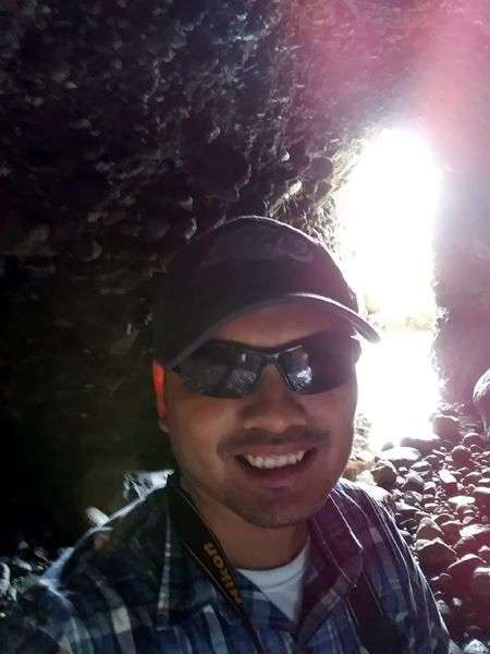 Posing for a selfie inside Pirate's Cave at a Dana Point beach in Orange County, CA...on April 20, 2019.