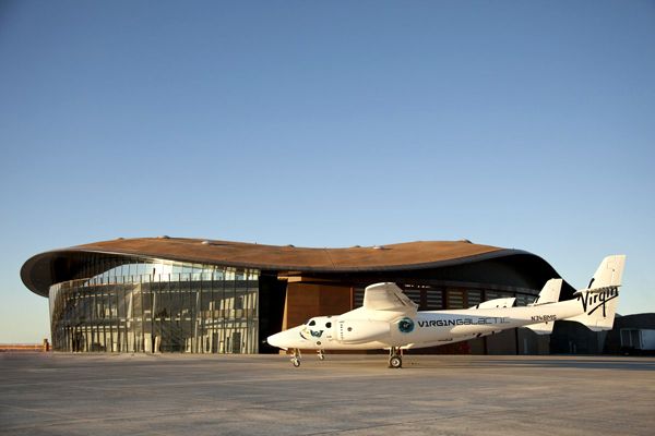 A snapshot of Virgin Galactic's White Knight II parked near the main hangar at Spaceport America in New Mexico.