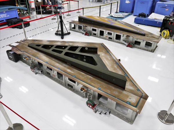 The two wings for the Dream Chaser are unveiled at Sierra Nevada's production facility in Louisville, Colorado.