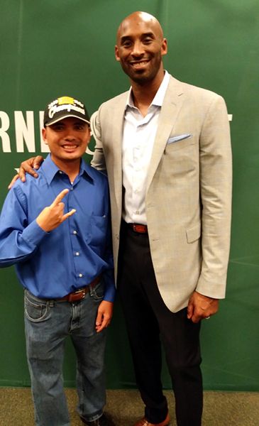 Posing with Kobe Bryant during a photo op inside Barnes & Noble bookstore at The Grove in Los Angeles...on October 23, 2018.