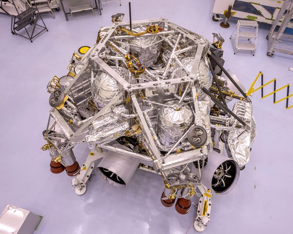 The Perseverance Mars rover is visible underneath its descent stage at NASA's Kennedy Space Center in Florida...on April 29, 2020.