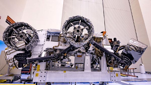 At NASA's Kennedy Space Center in Florida, Perseverance's six flight wheels are attached to the Mars rover.