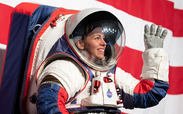 NASA engineer Kristine Davis wears a prototype of the Exploration Extravehicular Mobility Unit at an event in NASA Headquarters...on October 15, 2019.